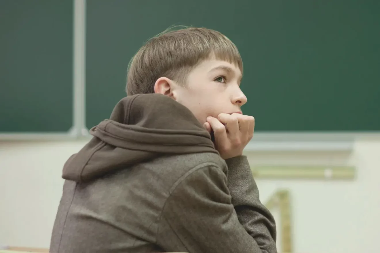 Student participating in a classroom activity
