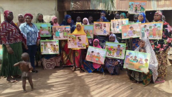 Women taking part in an awareness-raising session on the Better Schools for Girls programme